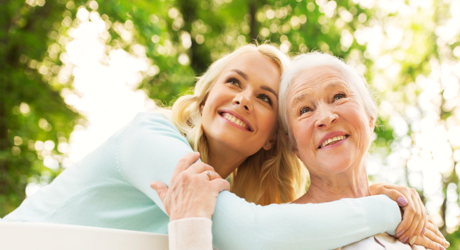 caretaker hug the elderly woman